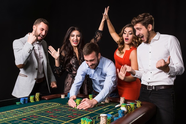 Group Young People Roulette Table Black Background Winning Player Bright Emotions 639032 684